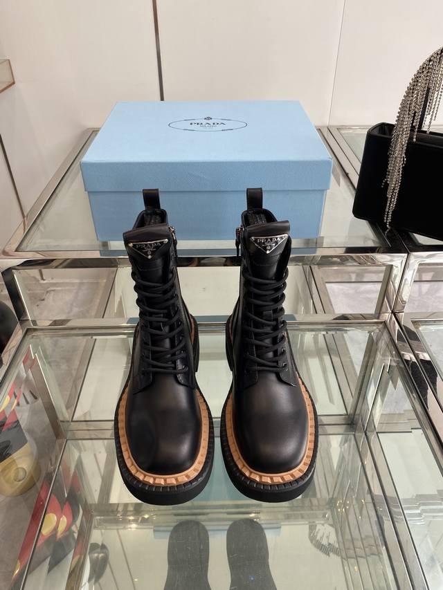 Prada classic triangle logo long boots, a key collection for this fall/winter. F