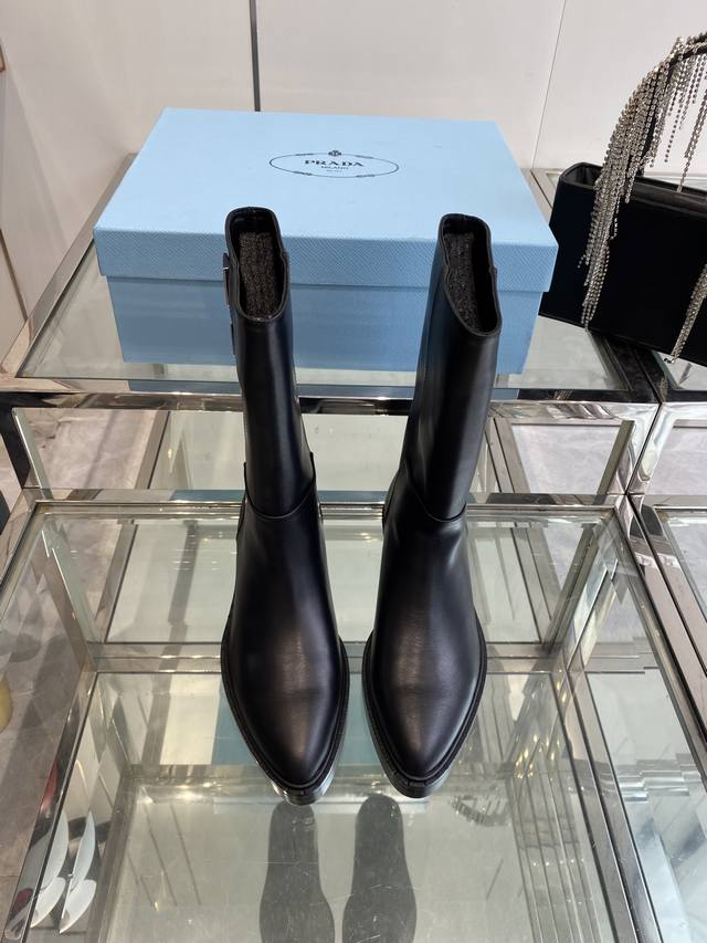 Prada Fall/Winter New Triangle Logo Pointed Toe Boots Prada boots are perfect fo