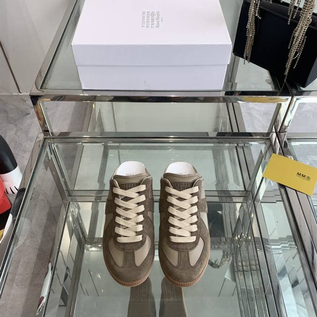 Maison Margiela Mm6 Couple's Half-Slip-On German Trainer Shoes These are the mos