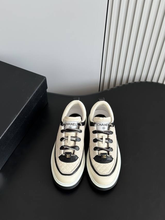 Chanel 2025C runway color-blocked platform sneakers. Unlike previous styles, the