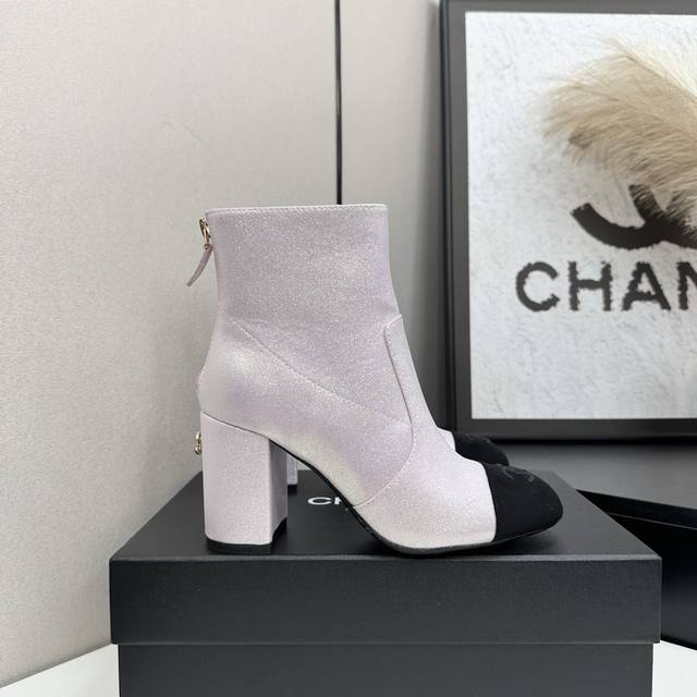 Chanel Classic Color-Blocked Chunky Heel Back Zipper Ankle Boots. These boots cl