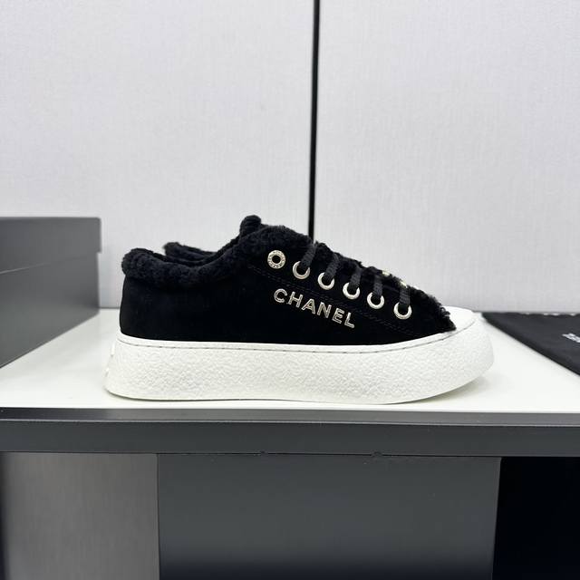 Chanel Top-Tier Casual Sneakers. This classic design features a multi-layered em