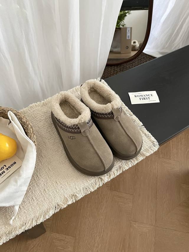 New Ugg Arrival! These mini-potato-style ethnic-inspired curly wool shoes featur