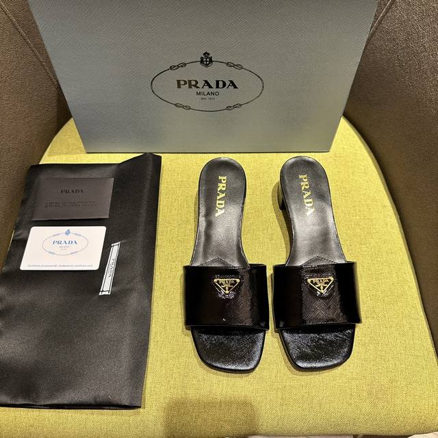 Prada's Spring/Summer Saffiano patent leather mid-heel mules have arrived! Recom