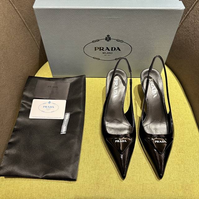 Prada's Spring/Summer Saffiano Patent Leather Slingback Heels have arrived! Reco