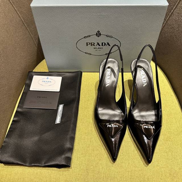 Prada's Spring/Summer Saffiano Patent Leather Slingback Heels have arrived! Reco