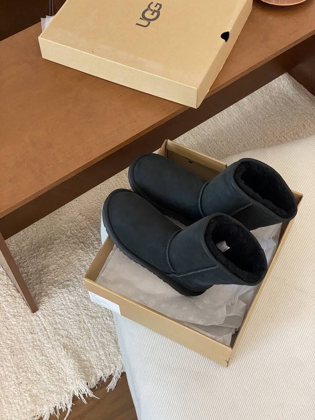 Ugg basic mid-calf sheepskin snow boots, available in black, grey, and maroon, s