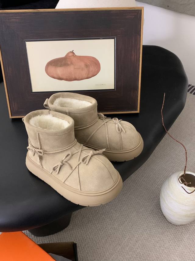 Ugg lace-up bow series. Cute, casual, and ladylike style, made of cowhide and wo