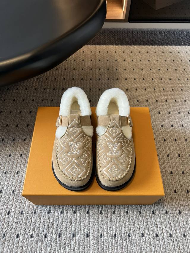 Top Quality Louis Vuitto Monogram Embroidered Plush Mules. These mules blend a r
