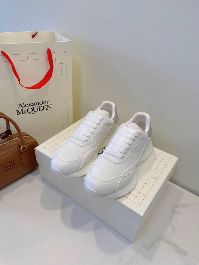 Women's & Men's Alexander McQueen. High-end quality as always, clean and crisp w
