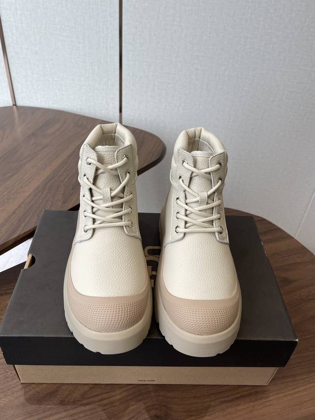 Ugg Tasman Weather Hybrid unisex slip-on shoes feature a classic Tasman silhouet