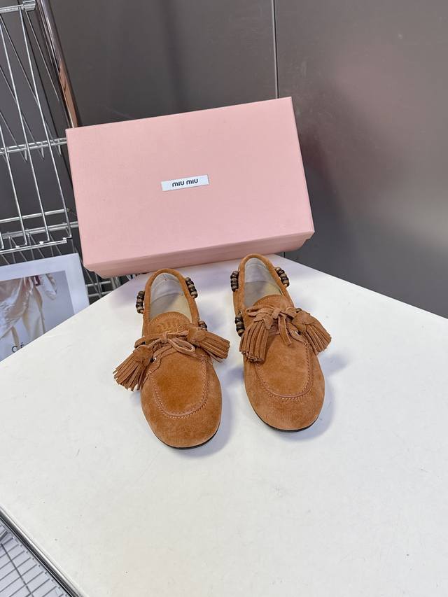 Miu Miu Milan Runway Spring/Summer Half-Slipper Loafers A close-up of the "slopp