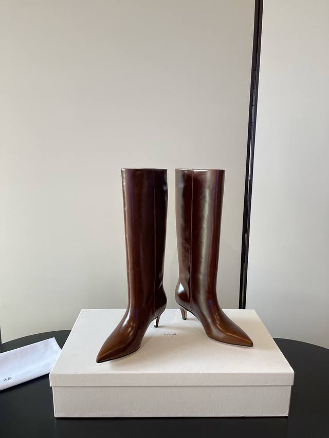 By Far Latest butter leather ankle boots with a low heel, a versatile style, as