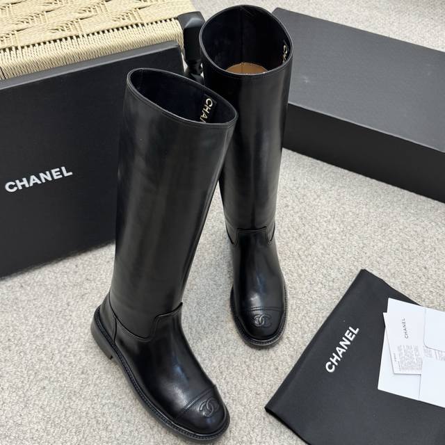 Classic Chanel Double C Rider Boots. These boots are versatile and can be paired