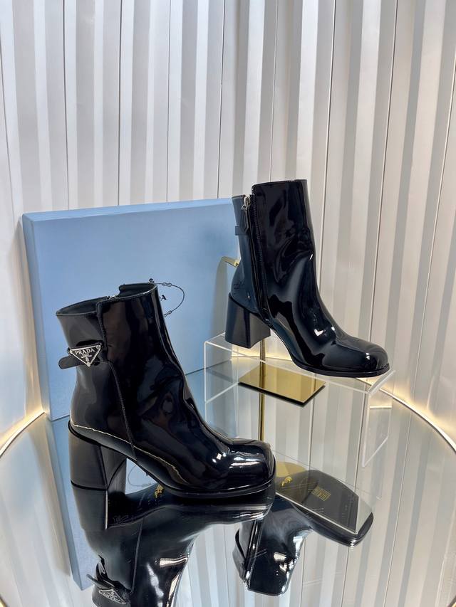 Prada Round Toe Zipper Chunky Heel Ankle Boots. These boots are perfect for impo