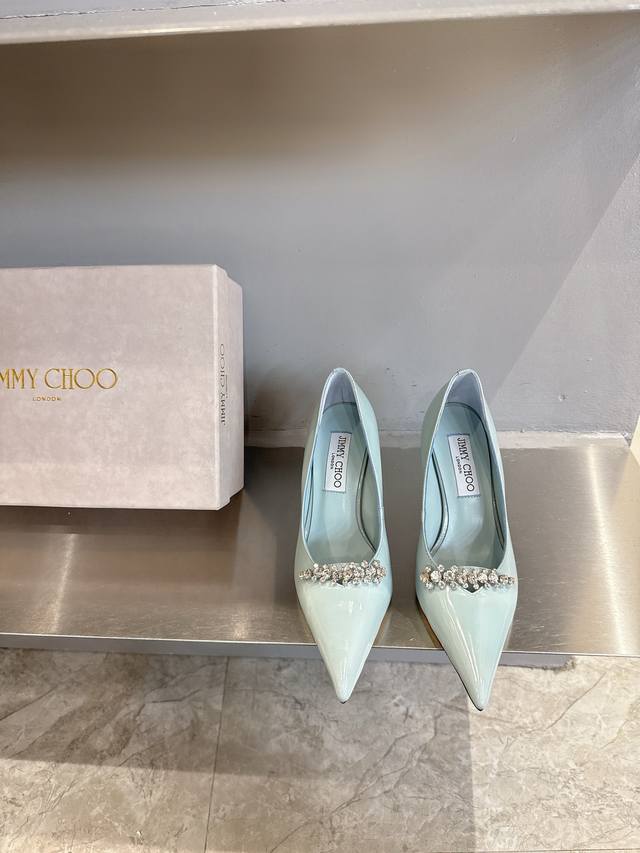 Jimmy Choo's latest pointed-toe flats, synchronized with boutiques. The upper de