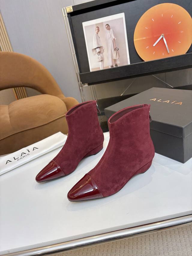 Price: Brand: Alaia Alaia 25 New Arrow Ankle Boots These pointed-toe ankle boots