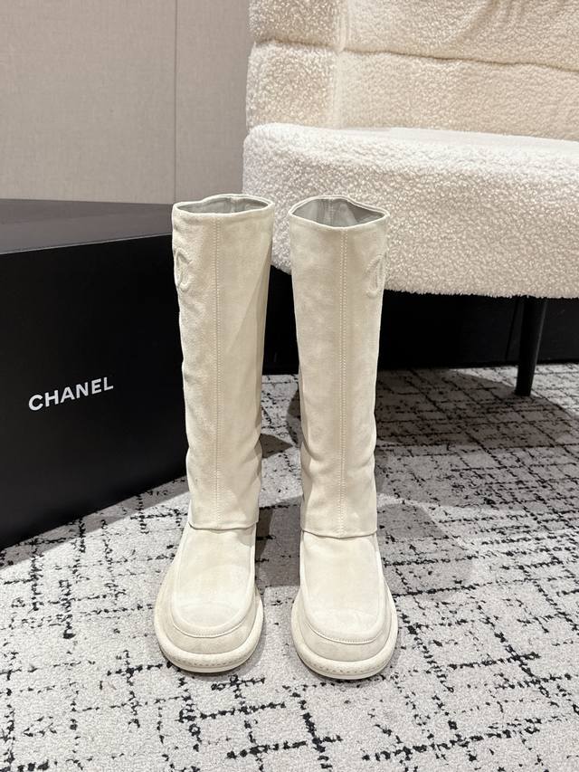 Chanel's newest and most beautiful suede long boots. These Chanel boots are abso