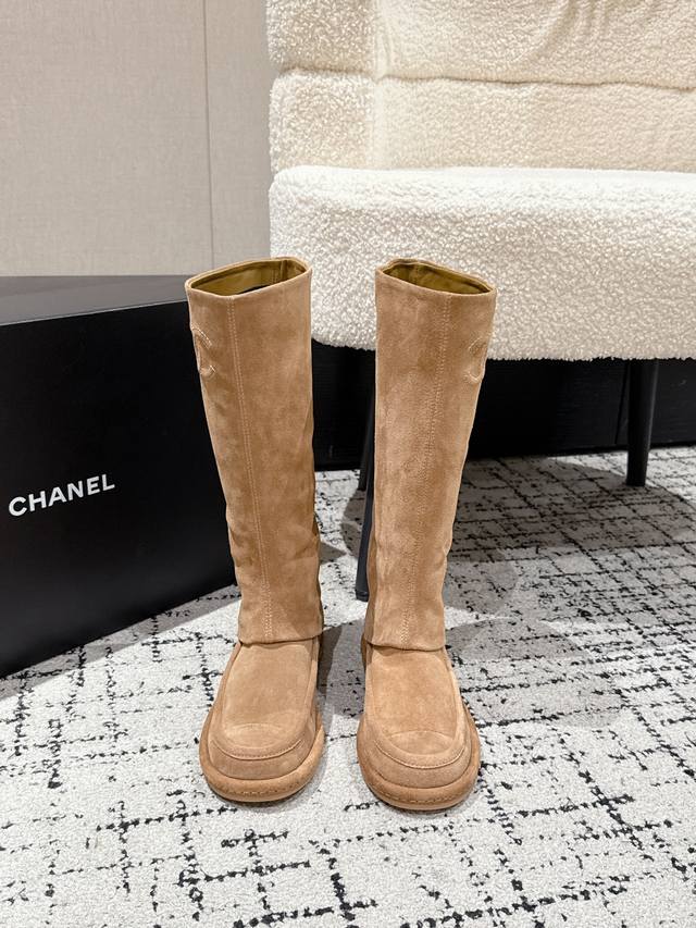 Chanel's newest and most beautiful suede long boots. These Chanel boots are abso