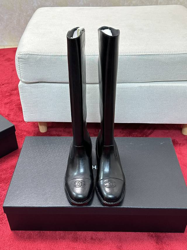 Price: Chanel* | Classic Chanel Double C Chunky Heel Riding Boots Chic and minim