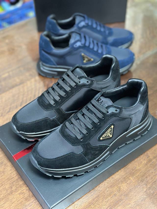 2Ee436 This sneaker features a dynamic silhouette with a mix of Re-Nylon and sue