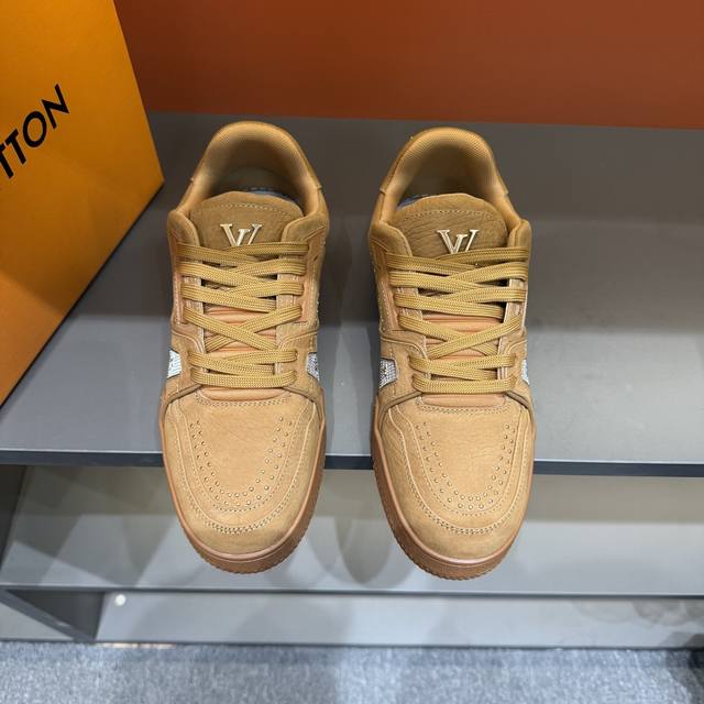 Sizes 38-45. This new colorway of the Louis Vuitton Trainer sneaker is crafted f