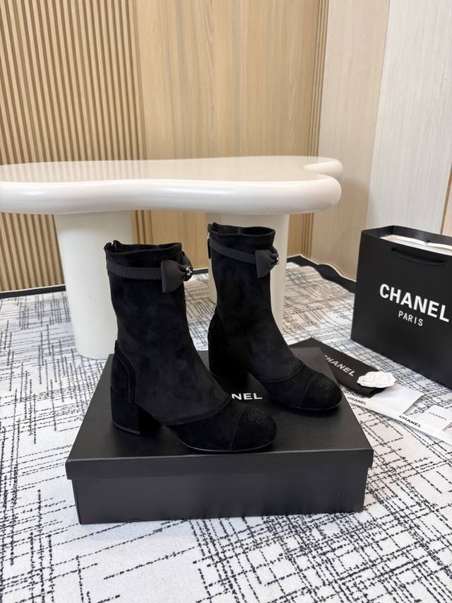 Chanel Classic Chunky Heel Back Zipper Ankle Boots. These boots cleverly blend i