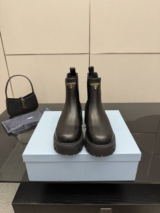 Prada Ankle Boots Recently received incredible praise for Prada's innovative des