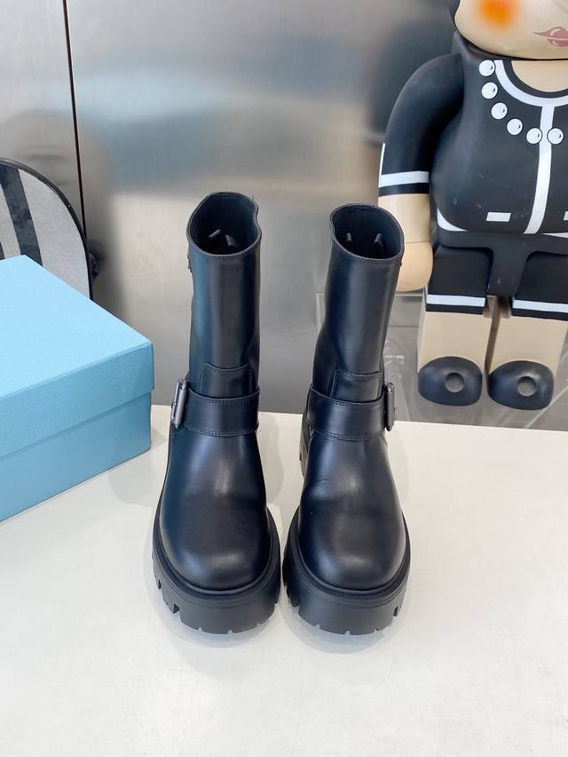 Prada Classic Triangle Logo Slip-on Women's Boots (Size 25Ss) - A must-have for