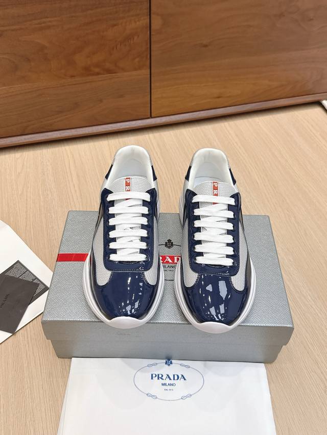 High-quality Prada America's Cup series patent leather mesh casual sneakers. Ori