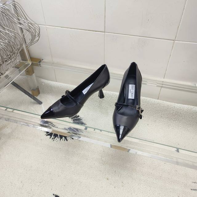 Jimmy Choo 65 High Heels. Made with imported soft lambskin and patent leather, t