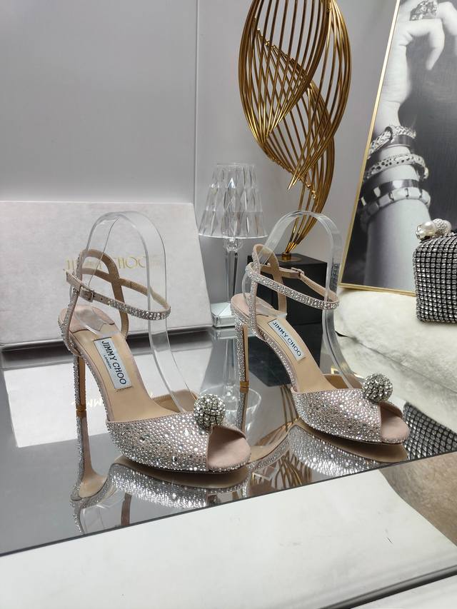 Jimmy Choo vintage-style sandals, handcrafted in nude pink shimmering suede and