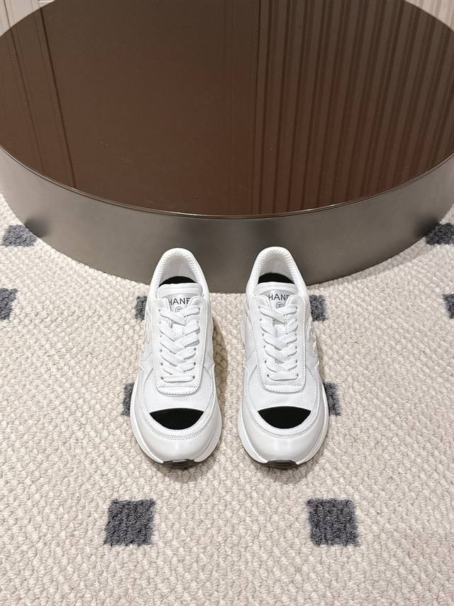 Sizes 35-40. Chanel 2025 high-heeled sneakers, in classic black and white, conti