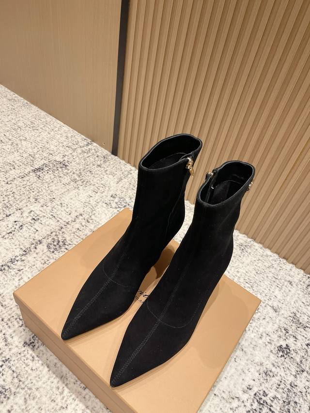 Top-tier version: Gianvito Rossi pointed-toe side zipper ankle boots. Simple and