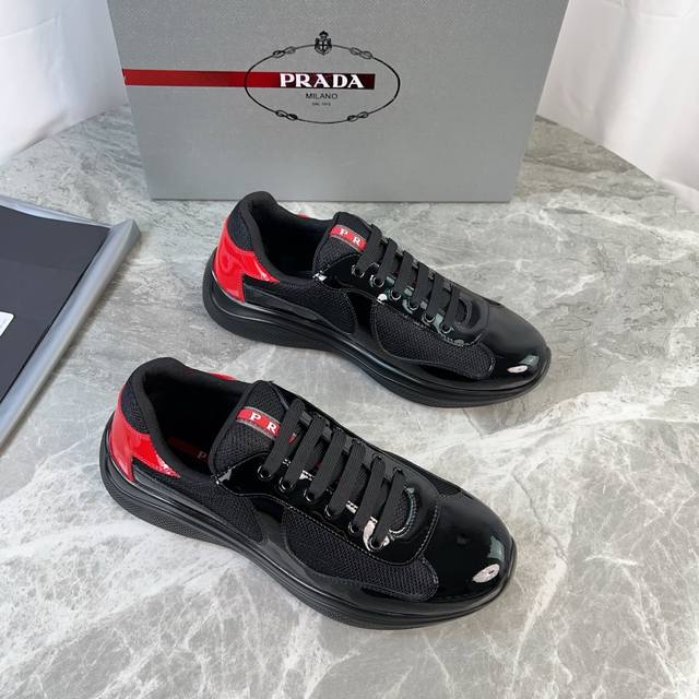 Classic P-brand design. Outer layer: Top-grain patent leather + brand mesh fabri