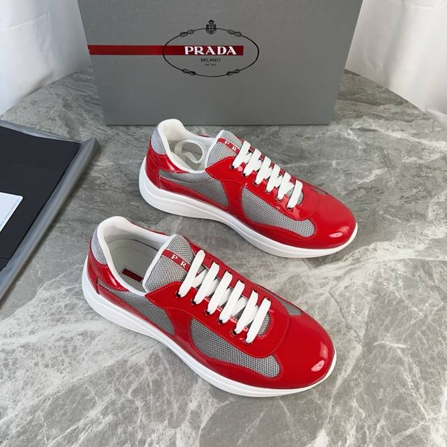 Classic P-brand design. Outer layer: Top-grain patent leather + brand mesh fabri