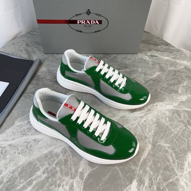 Classic P-brand design. Outer layer: Top-grain patent leather + brand mesh fabri