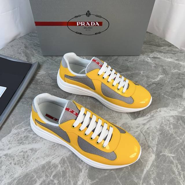 Classic P-brand design. Outer layer: Top-grain patent leather + brand mesh fabri