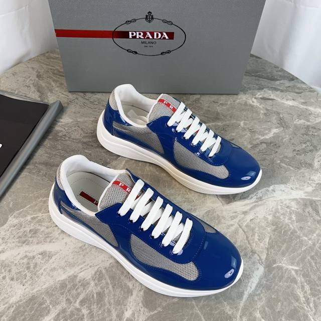 Classic P-brand design. Outer layer: Top-grain patent leather + brand mesh fabri