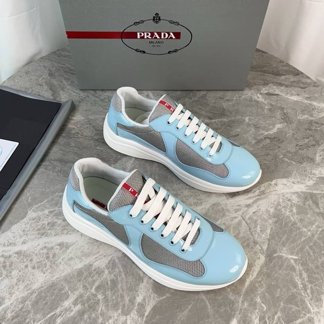 Classic P-brand design. Outer layer: Top-grain patent leather + brand mesh fabri