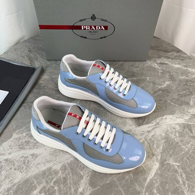 Classic P-brand design. Outer layer: Top-grain patent leather + brand mesh fabri