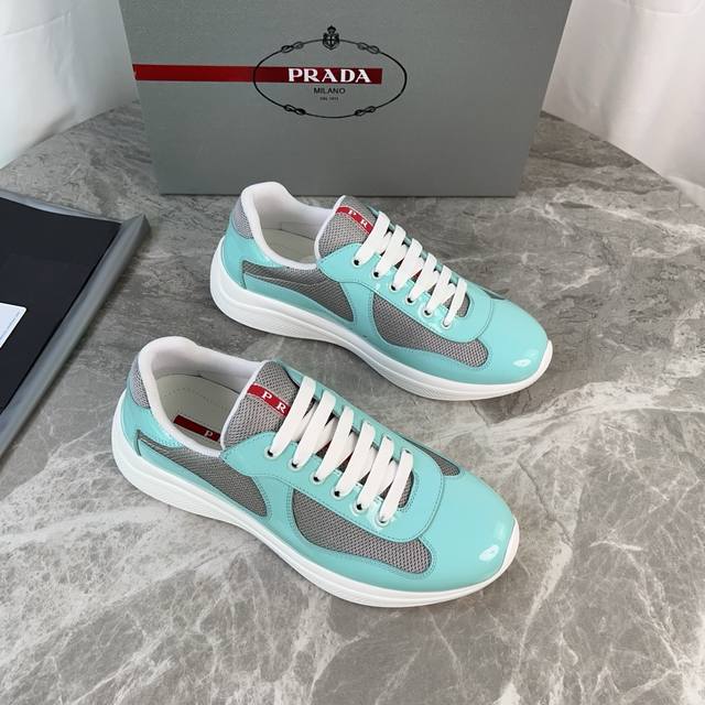 Classic P-brand design. Outer layer: Top-grain patent leather + brand mesh fabri