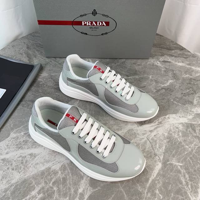 Classic P-brand design. Outer layer: Top-grain patent leather + brand mesh fabri