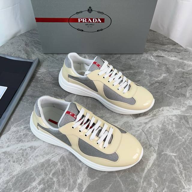 Classic P-brand design. Outer layer: Top-grain patent leather + brand mesh fabri