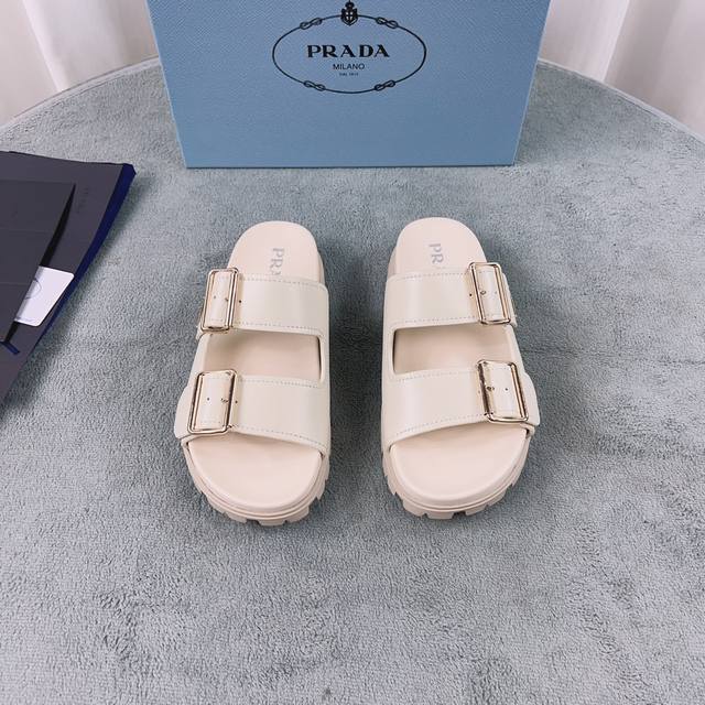 Prada's latest style. Upper: Imported cowhide and suede. Lining: Imported water-