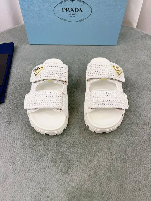 Latest Prada model. Outer: Original custom raffia leather. Lining: Imported mixe Latest Prada model. Outer: Original custom raffia leather. Lining: Imported mixe