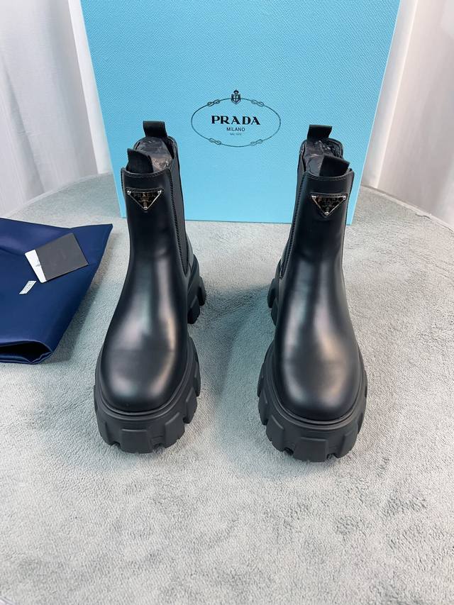 Prada's latest Fall/Winter ankle boots. Upper: Imported split cowhide leather; L