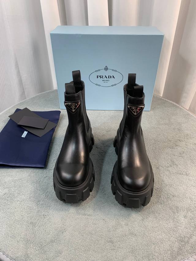 Prada's latest Fall/Winter ankle boots. Upper: Imported calfskin; Lining: Import