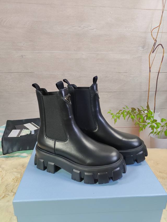 Prada 's latest autumn/winter ankle boots. Upper: Imported calfskin. Lining: Imp