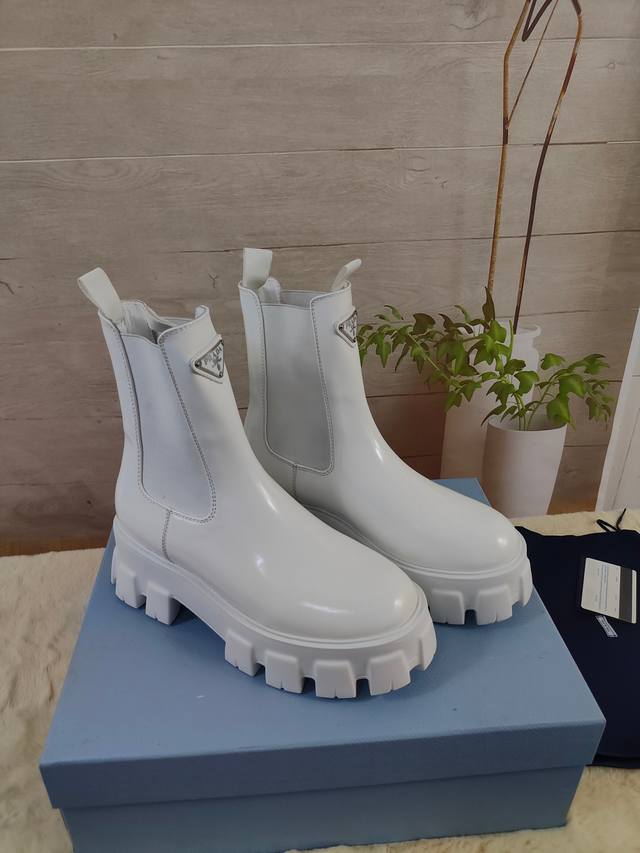 Prada's latest autumn/winter ankle boots. Upper: Imported calfskin. Lining: Impo